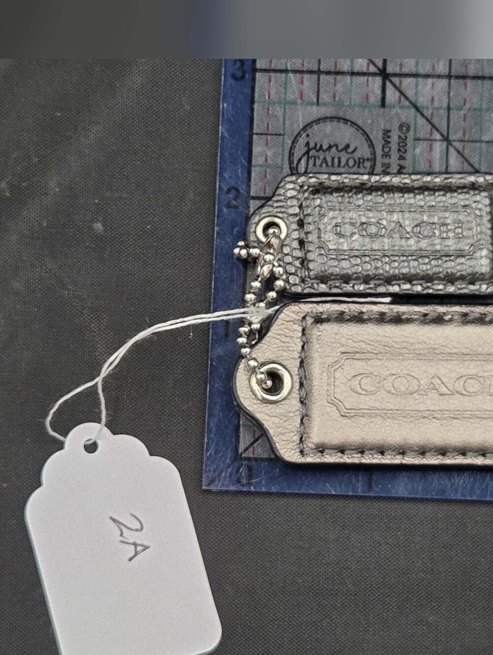 Coach Metallic Leather Logo Bag Tags